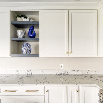Navy Stained Island, Hood vent and Floating Shelves in White Shaker Kitchen