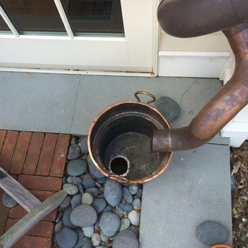 The Roofer's copper Downspouts