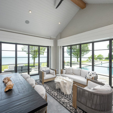 Closed Steel Effect Glass Walls Keep the Lake View for Year-Round Use