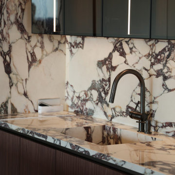 Modern kitchen and living room with ceramic top
