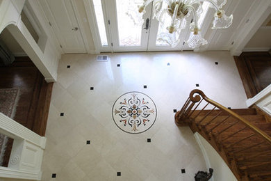 Elegant marble floor entryway photo in Atlanta