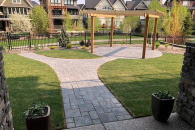 Patio - large patio idea in Calgary