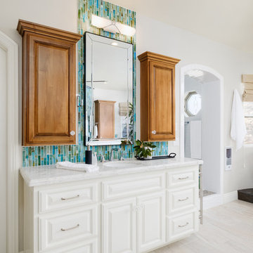 White & Bright Master Bathroom w/ Teal mosaic tile backsplash & Freestanding tub