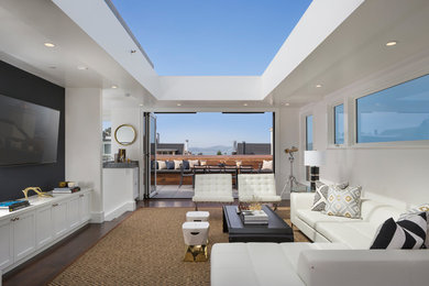Living room - mid-sized contemporary open concept dark wood floor and brown floor living room idea in San Francisco with white walls, no fireplace and a wall-mounted tv