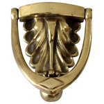 unknown - Consigned, Antique Brass Door Knocker - This is an antique brass door knocker. The scalloped crest door knocker has a sconce like shape with swinging arm. Holes on back for mounting.