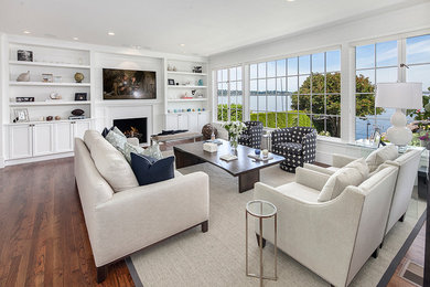 Large beach style formal open concept living room in Seattle with grey walls, dark hardwood floors, a standard fireplace, a stone fireplace surround, no tv and brown floor.
