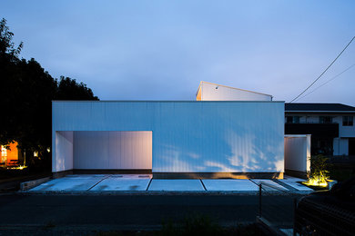 Modern exterior home idea in Other