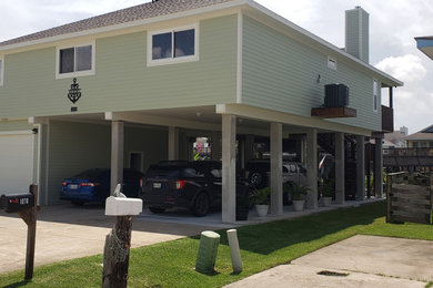 Mid-sized beach style garage photo in Houston