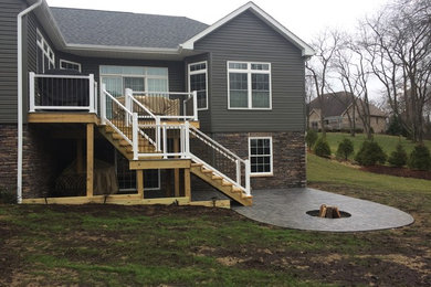Deck - mid-sized backyard deck idea in Other