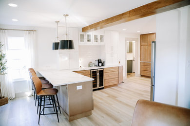 Example of a large transitional living room design in Other