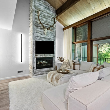 AFTER - SOUTH WALL, ADDITION OF FIREPLACE, NEW LIGHTING, FURNISHINGS & DECOR