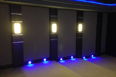 Home theater - contemporary home theater idea in Seattle