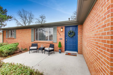 Transitional exterior home idea in Denver