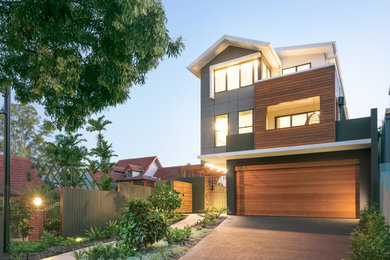 Photo of a modern three-storey house exterior in Brisbane.