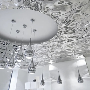 Face Store - Aqua glass wall panels for the ceiling.