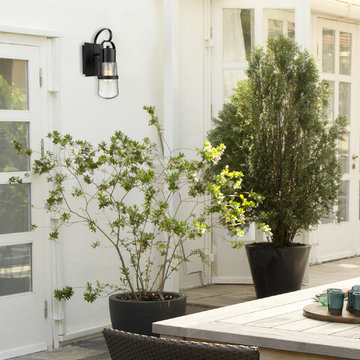 Helm 12" 1-Light Outdoor Wall Sconce, Matte Black Finish, Clear Seeded Glass Sha