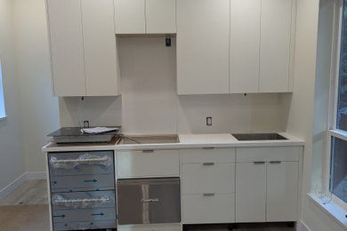 Kitchen - small modern kitchen idea in Vancouver