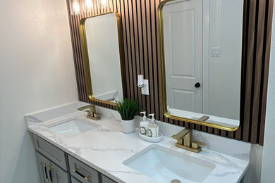 Bathroom - mid-sized modern double-sink bathroom idea in Houston with shaker cabinets, gray cabinets, quartz countertops, white countertops and a built-in vanity
