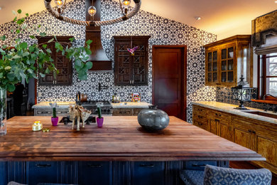 Inspiration for an eclectic kitchen in Other with with island.