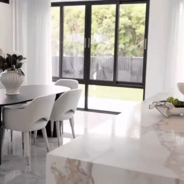 Formal Dining Zone Adjacent To Open Kitchen Layout