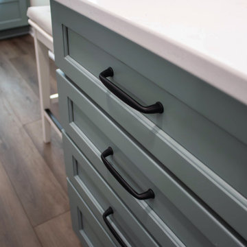 Custom Two-Toned Green and White Kitchen with Laventa Carrara Quartz Countertops