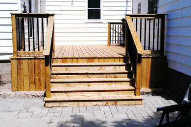 Inspiration for a large timeless one-story exterior home remodel in Other