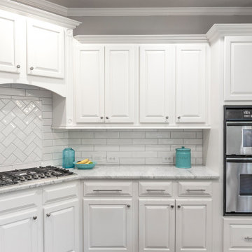 White subway tile & Marble Kitchen