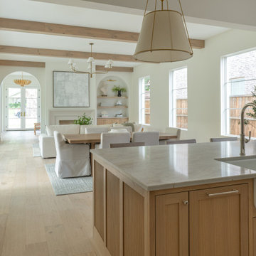 Kitchen island overlooking the open dining and living spaces