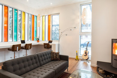Inspiration for a modern living room remodel in Ottawa with white walls