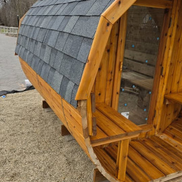 Cedar Barrel Sauna with panoramic window and porch