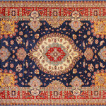 Bareens Designer Rugs - Tribal Super Kazak Leslie Blue/Red Wool Rug 8'9'' x 12'4'' - Embellish your home with this exquisitely hand-knotted Kazak Rug made with the finest hand spun wool and all vegetable dyes. Demonstrating incredible attention to detail, this hand-knotted masterpiece features an intricate Kazak pattern in a classic color palette. Made in the Caucasian designs from Russia and the northern Persian empire, each Kazak incorporates distinctive tribal flavor with elements such as the stepped hooted polygons, geometrical medallions, animals and rosettes. The straight, clean lines and bold tones embody the weaving style of the Armenian and Afghani weavers known for these iconic designs. This magnificent rug featuring soft luscious pile and is made with handspun wool and natural dyes to produces soft luminous shades causing a beautiful sheen. With geometric designs and bold vibrant saturated colors predominately blues, reds, greens, and gold make a bold statement in any decor. The construction technique used ensures that the designs and colors Ae capable to withstand heavy traffic area.