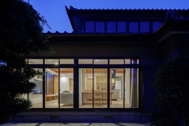 Example of an exterior home design in Other