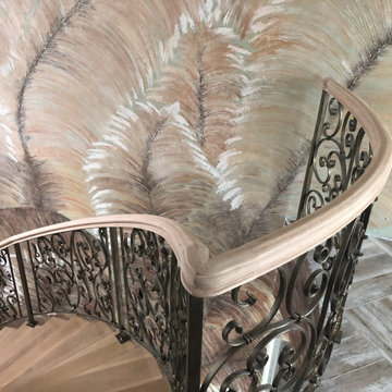 stunning wielded up stair system with a wood cap