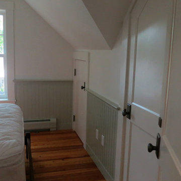 Garage apartment in green wainscotting