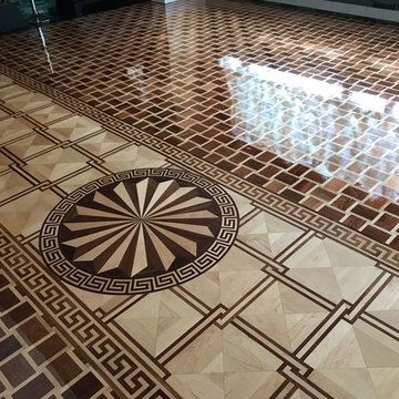 Decorative border frames the flooring much like a picture frame