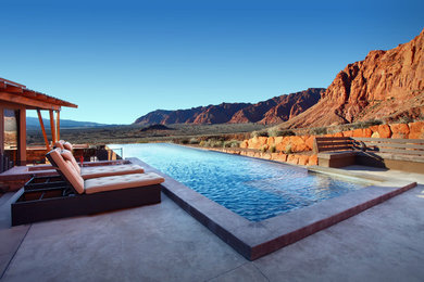 Pool - mid-sized southwestern backyard concrete and rectangular lap pool idea in Salt Lake City