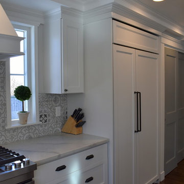 Wellborn Forest Hamilton door style in Arctic White and Oyster