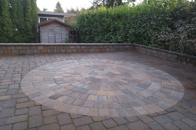Paver Patio with circle design by Aguiar Pavers LLC