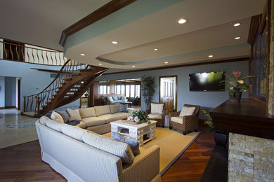 Living room - eclectic open concept living room idea in Boston with blue walls and a wall-mounted tv