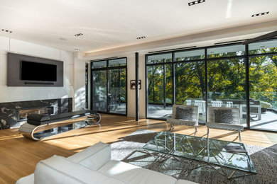 Example of a minimalist family room design in Toronto