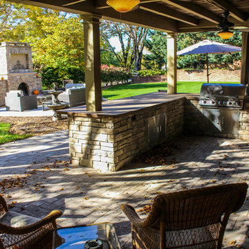 Perfect Outdoor Landscape Environment With Fire Pit, Patio, Stone Kitchen and Wa