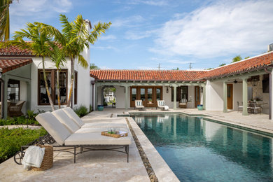 Inspiration for a mediterranean pool remodel in Tampa