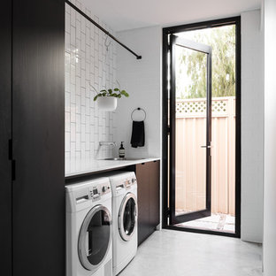 パースのインダストリアルスタイルのおしゃれなランドリールームの写真