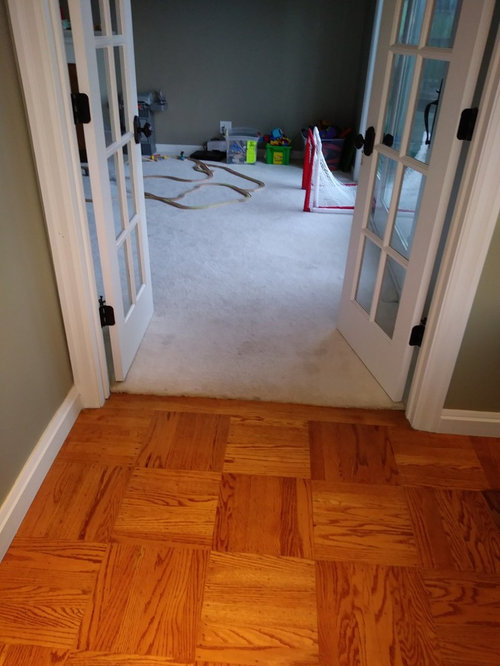 Replacing carpet with hardwood but next to existing hardwood and tile