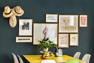 Dining room - mid-sized contemporary dining room idea in Tel Aviv with black walls and no fireplace