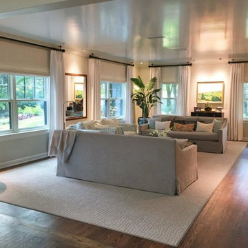Stationary drapery panels with woven wood shades