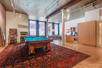 Example of an urban family room design in New York