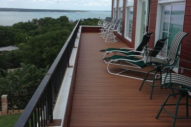Large elegant porch photo in Austin with decking