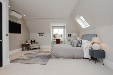 This is an example of a bedroom in Surrey.