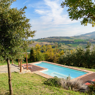 Oberirdisches, Kleines Landhaus Pool im Vorgarten in rechteckiger Form mit Pflasterklinker in Sonstige